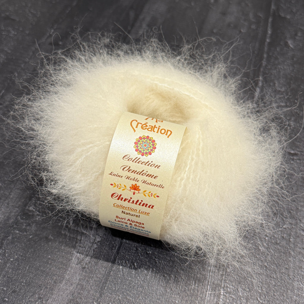 Christina : Suri alpaga, laine et soie. Pelote de 50g 95m. Aiguilles 5,5-6 mm.