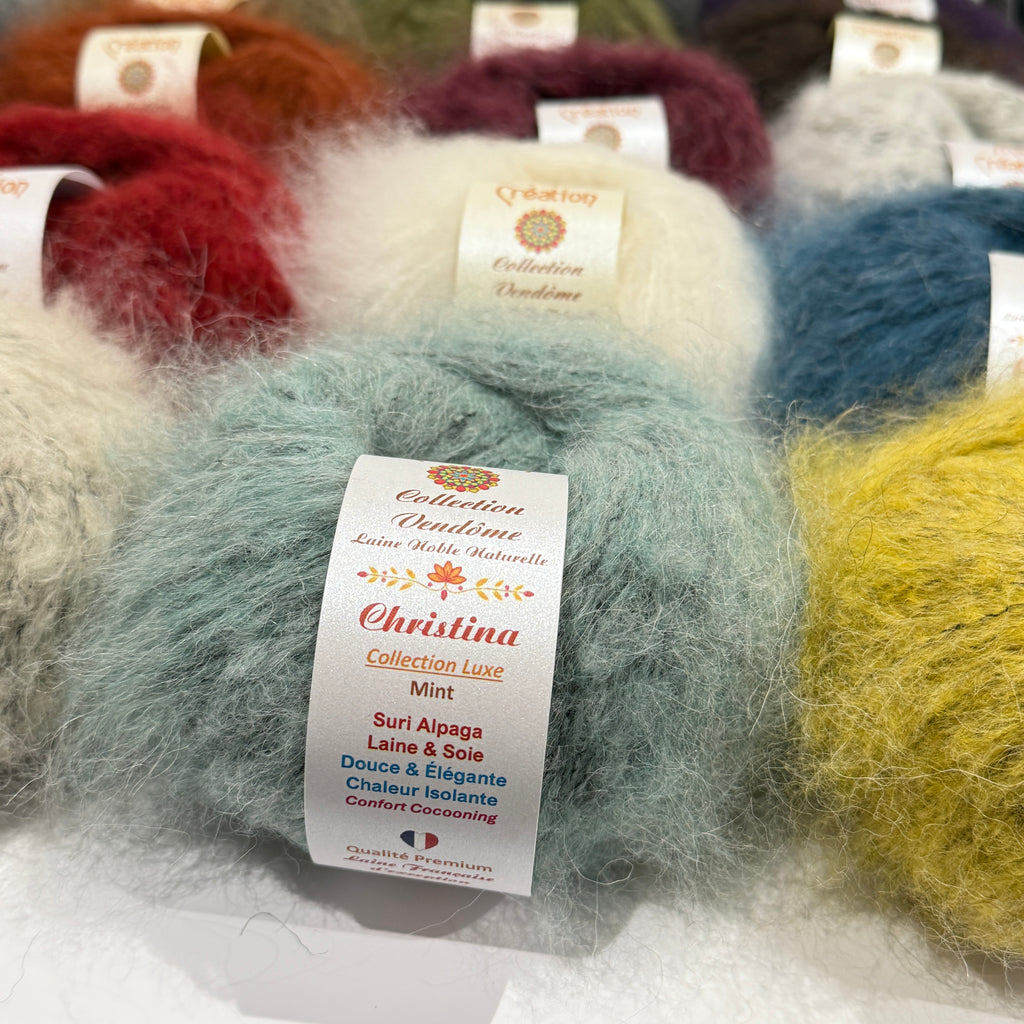 Christina : Suri alpaga, laine et soie. Pelote de 50g 95m. Aiguilles 5,5-6 mm.