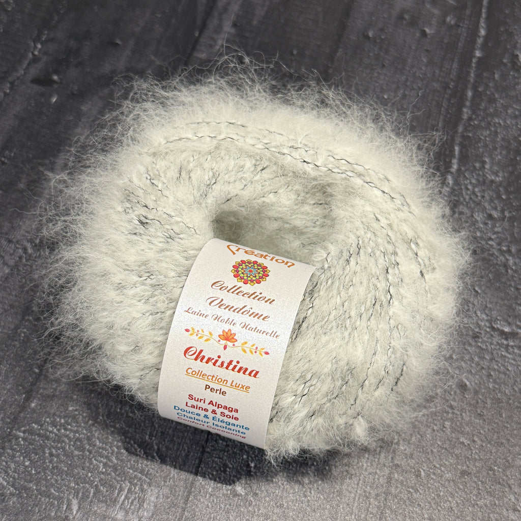 Christina : Suri alpaga, laine et soie. Pelote de 50g 95m. Aiguilles 5,5-6 mm.